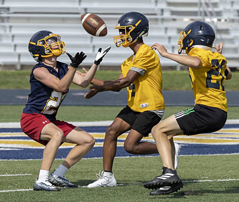 Sterling players run through drills during first day of football practice Monday, August 7, 2023.