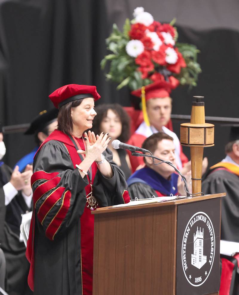 Northern Illinois University President Lisa Freeman applauds graduates Saturday, May 14, 2022, during the first of two undergraduate commencement ceremonies in the Convocation Center at NIU in DeKalb.
