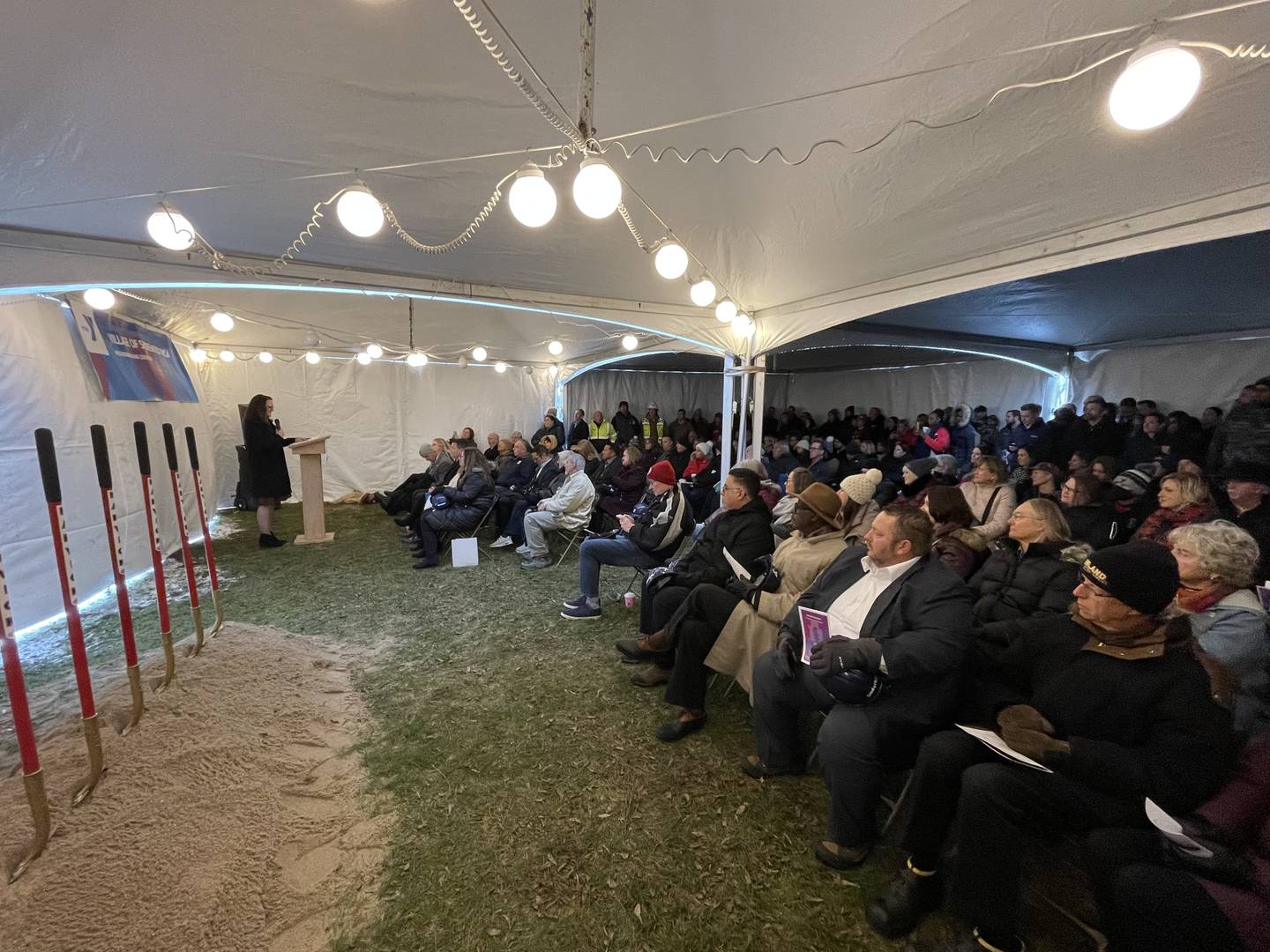 Village of Shorewood YCMA Executive Director Trisha Dust speaks to a standing room crowd at the Village of Shorewood YCMA groundbreaking ceremony on Thursday, Nov. 21, 2024 in Shorewood.