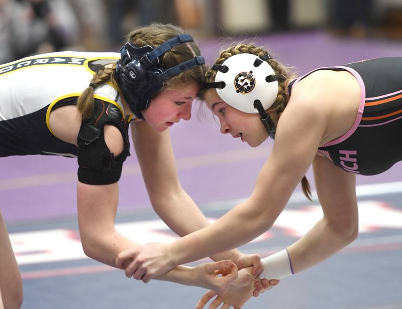 Polo's Aubrey Herndon (left) and Sandwich's Alexia Cather wrestle at 135 pounds at the Belvidere Regional on Saturday, Feb. 7, 2026.