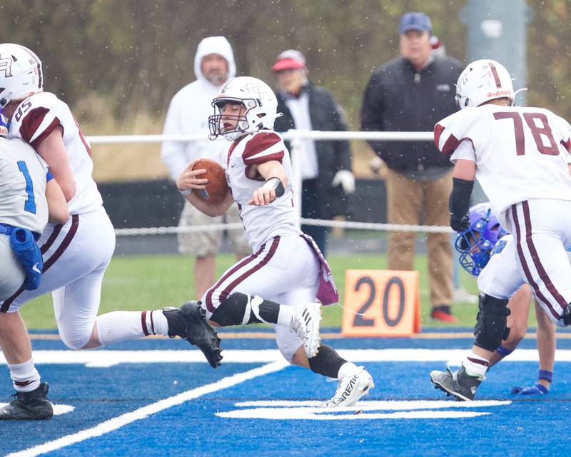Prarie Ridges Luke Vanderwiel runs the ball for a gain against St. Francis at the Class 5A second-round playoff game on Saturday Nov.9,2024 in Wheaton.