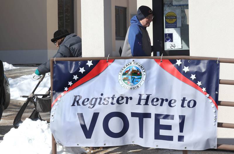 Voters arrive to cast their ballots in the primary election Tuesday, March 17, 2026, at the DeKalb County Administration Building in Sycamore.