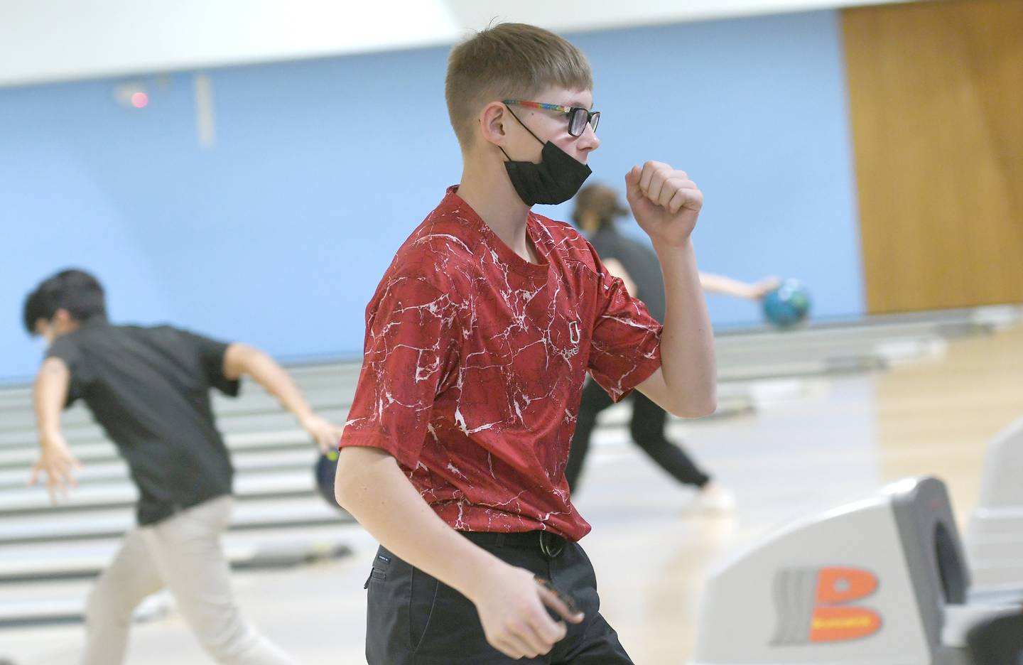 Oregon's Isaac Kaltenbrun celebrates a strike as he competes at the Hawk Claissc at Plum Hollow on Saturday.