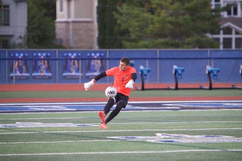 St. Charles North's Davis Hester kicks the ball away from the goal against Geneva on Tuesday, Sept. 9,2025 in St. Charles.