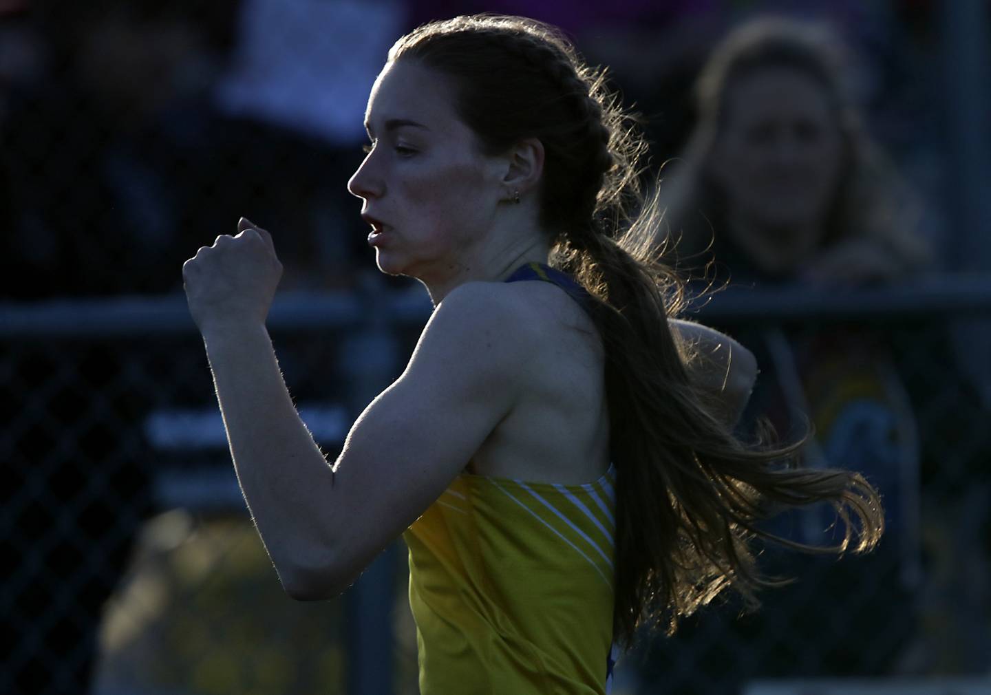 Johnsburg’s Caitlyn Casella runs to the finish line in 100 meter dash Thursday, April 21, 2022, during the McHenry County Track and Field Meet at Richmond-Burton High School.