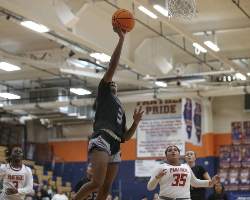Oswego East's Avay Kittling-Turner goes up with a lay up during their basketball game between Oswego East at Oswego Friday, Jan 09, 2026 in Oswego.