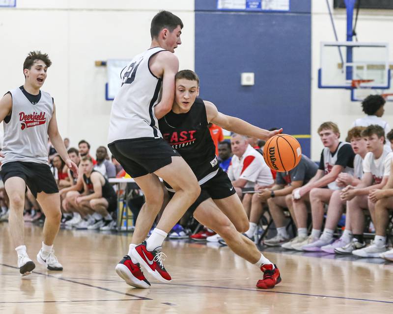 Glenbard East's Michael Nee leans into the defense in their Riverside-Brookfield Shootout basketball game.  June 20, 2025 in Riverside.