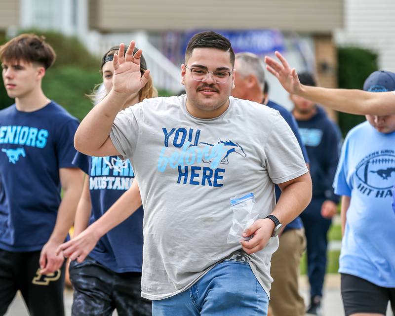 Special needs seniors march in the Downers Grove South Homecoming Parade. Sept 28, 2024 in Downers Grove.