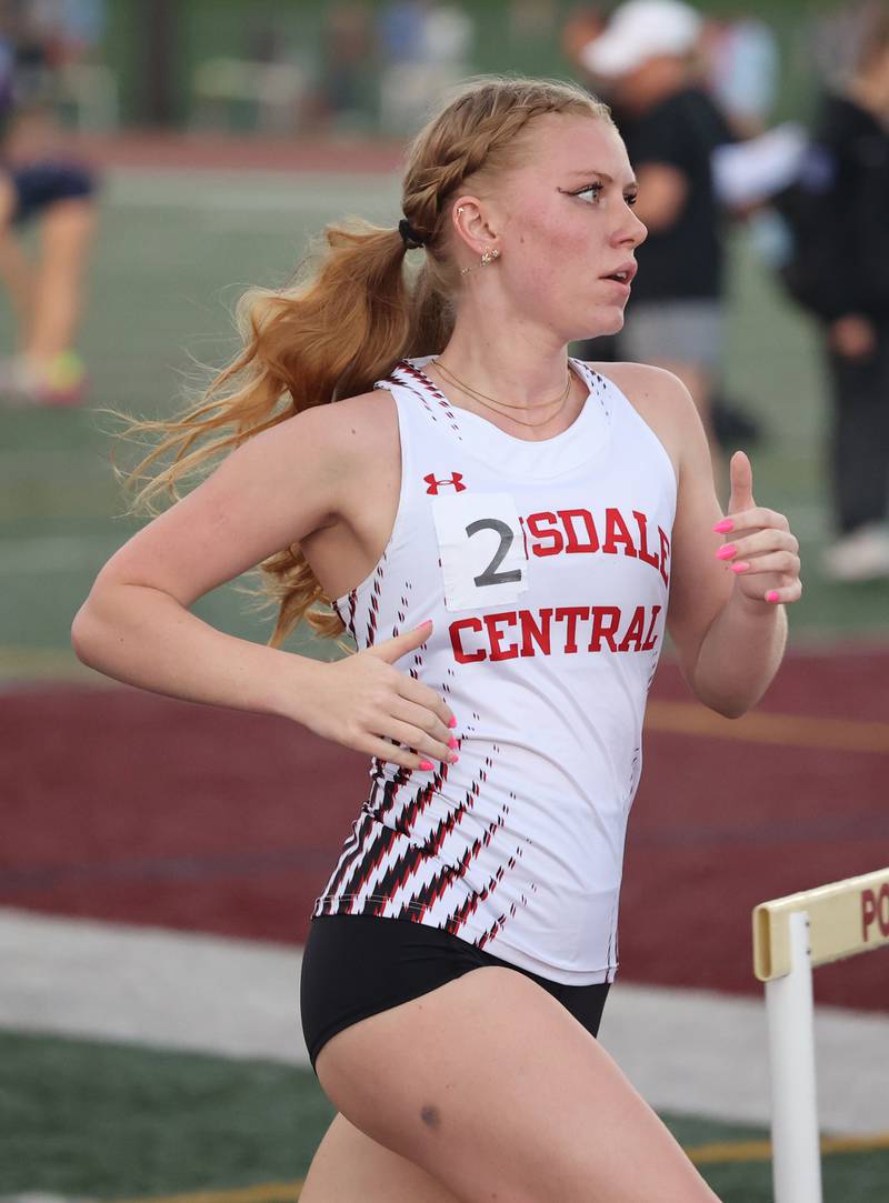 Hinsdale Central's Sarah Fischer runs the 3,200 during the 3A Lockport Sectional on Friday, May 12, 2023.