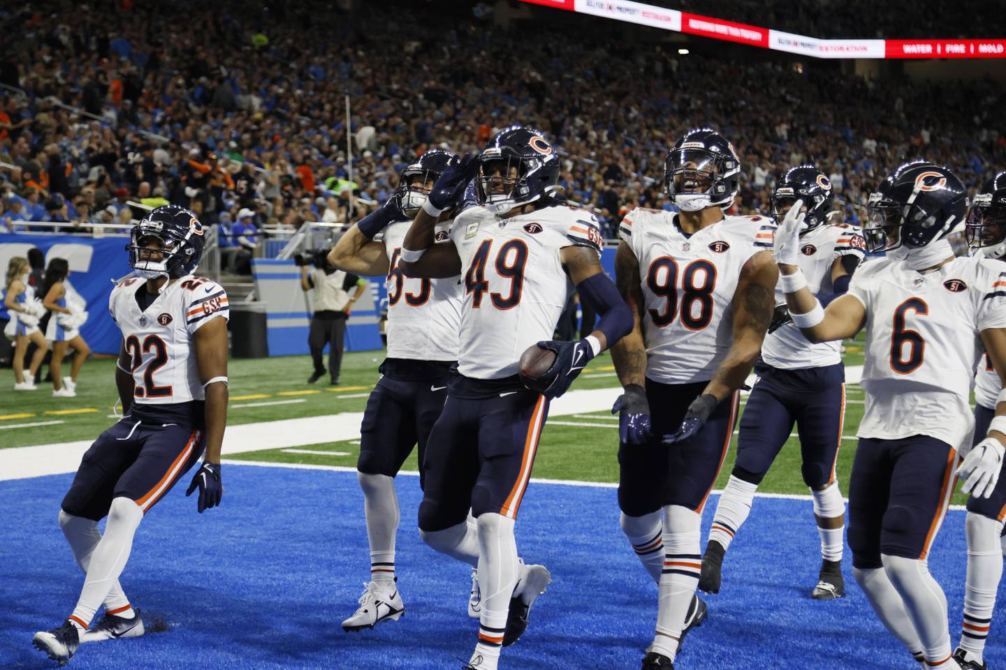 Chicago Bears linebacker Tremaine Edmunds and teammates react after Edmunds' interception during the second half against the Detroit Lions, Sunday, Nov. 19, 2023, in Detroit.