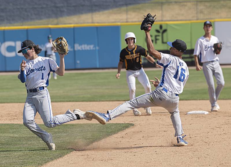 Newman’s Garret Matznick and Isaiah Williams slightly collide while playing Goreville Saturday, June 3, 2023 during the IHSA class 1A third place baseball game.