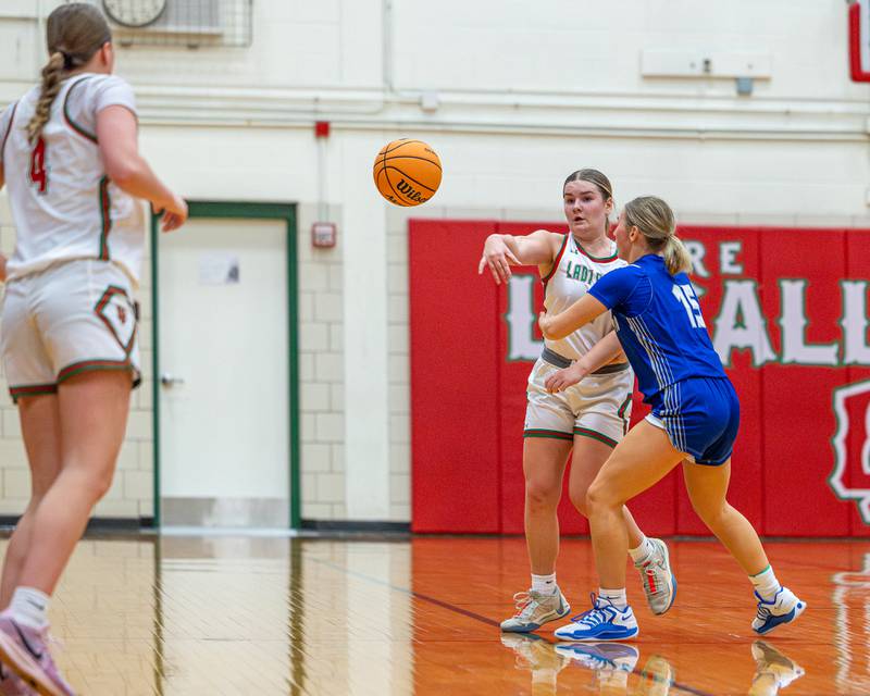 L-P's Emma Jereb (5) passes ball to teammate as Ava Munson (15) of Princeton defends on Saturday, Feb. 7, 2026 in Sellett Gymnasium at L-P High School.