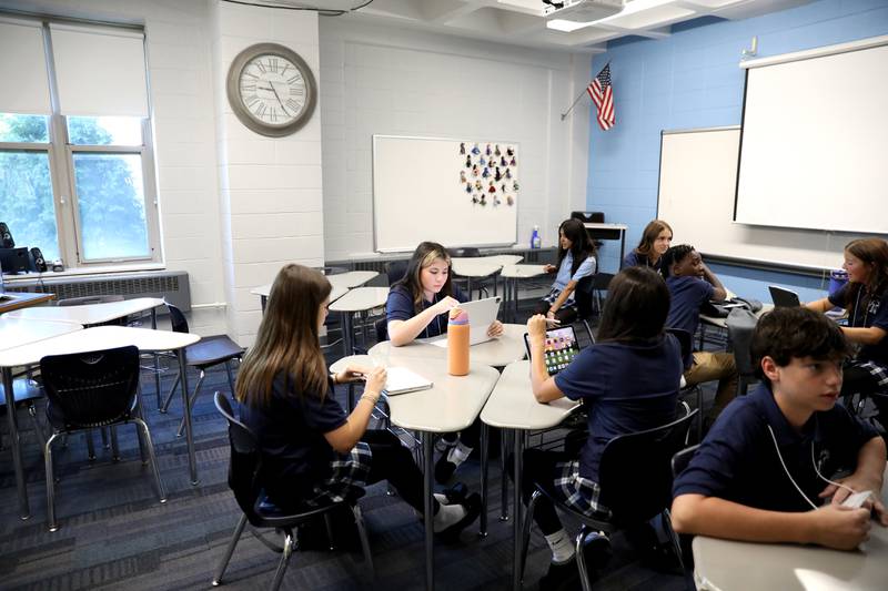 Nazareth Academy incoming freshmen get to know their homeroom setting on Friday, Aug. 16, 2024 as part of Freshman Orientation in La Grange Park.