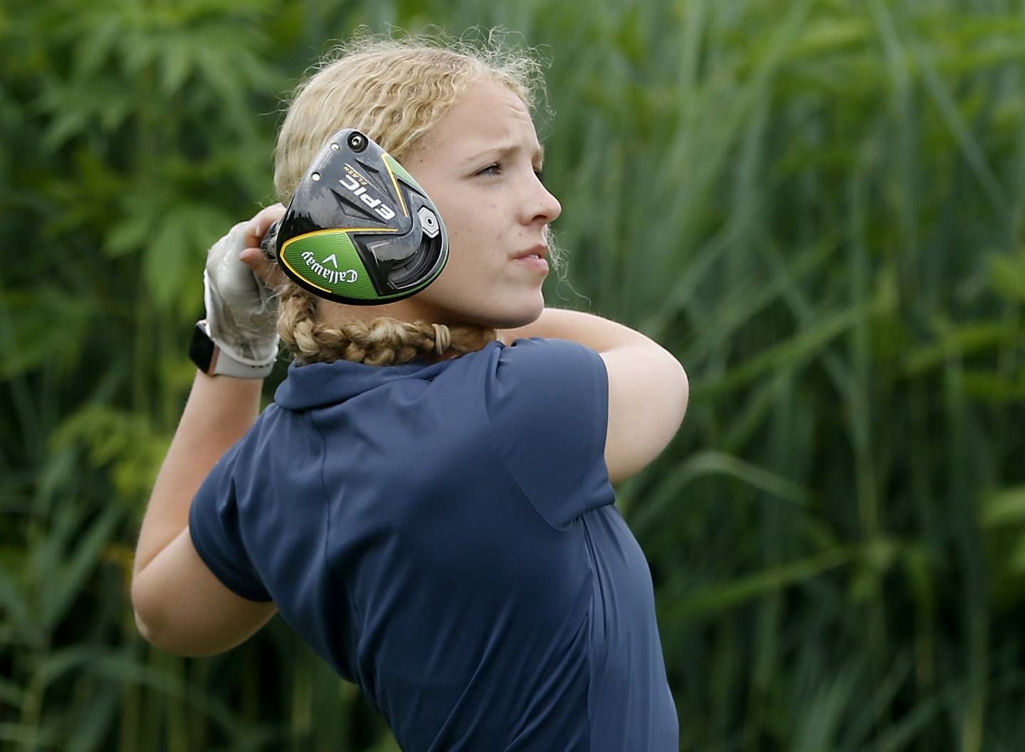 Johnsburg’s Riley Klotz watches her tee shot on the first hole of the Creekside course Wednesday, July 12, 2023, during the second round of the the McHenry County Junior Golf Association's McHenry County Junior Amateur tournament at Boone Creek Golf Club, in Bull Valley.