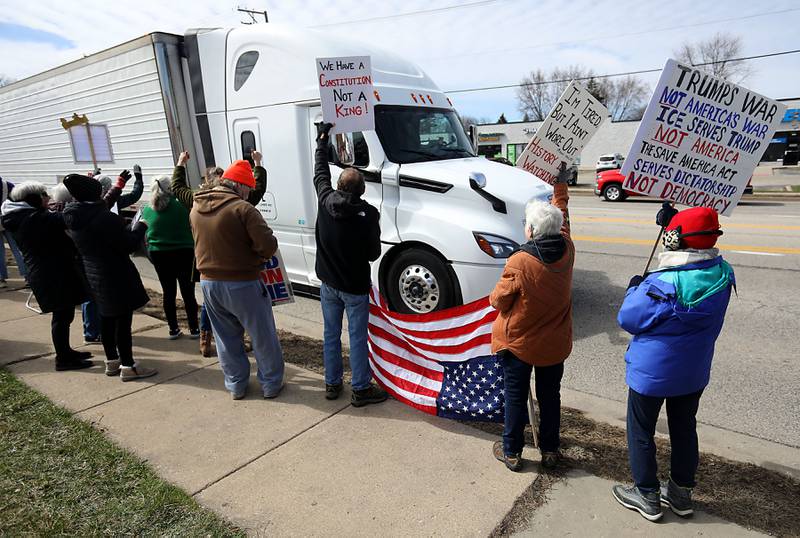 Protesters line State Route 31 near the intersection of McCullom Lake Road in McHenry to protest their discontent with President Donald Trump and his administration's policies on Saturday, March 28, 2026, during the McHenry County No Kings Protest. According to an organizer, over 4,000, people took part in the protest.