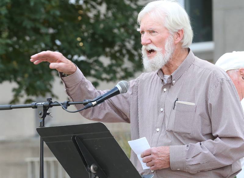 Rich Borys speaks during a vigil for Charlie Kirk on the front steps of the Bureau County Courthouse on Monday, Sept. 15, 2025 in Princeton. Borys met Kirk when he spoke in Princeton in 2012. Around 200 people attended the vigil.