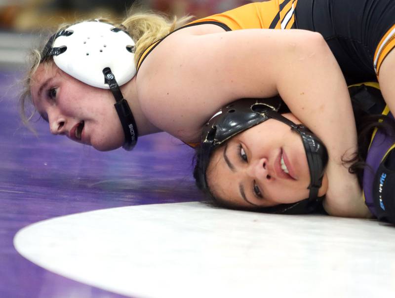 McHenry’s Madalynn Sima pins Rolling Meadows’ Leilani Brindis at 170 pounds in varsity girls IHSA Regional Championship wrestling action on Saturday, February 7, 2026, at Hampshire High School in Hampshire.