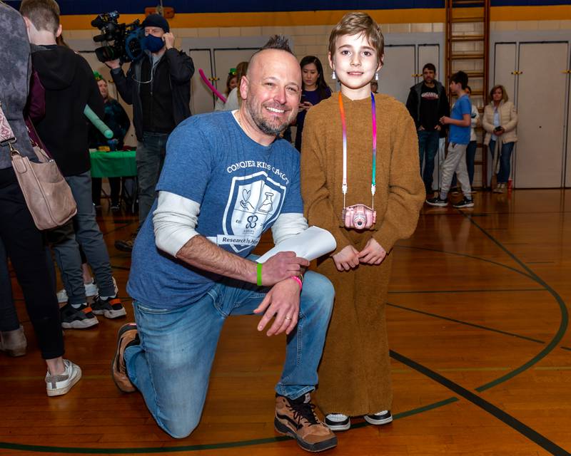 Organizer Josh Thomas with Gwen at the St Baldricks Foundation event for Gwen Cola at Forest Road Elementary School in La Grange Park. March 23, 2023.