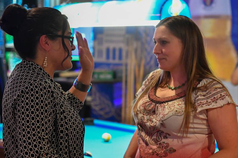 Illinois 43rd  District State Senate Candidate Rachel Ventura  talks with Joliet Junior College trustee Alicia Morales during a watch party  Tuesday, June 28, 2022 ,at Vella's Tap in Joliet