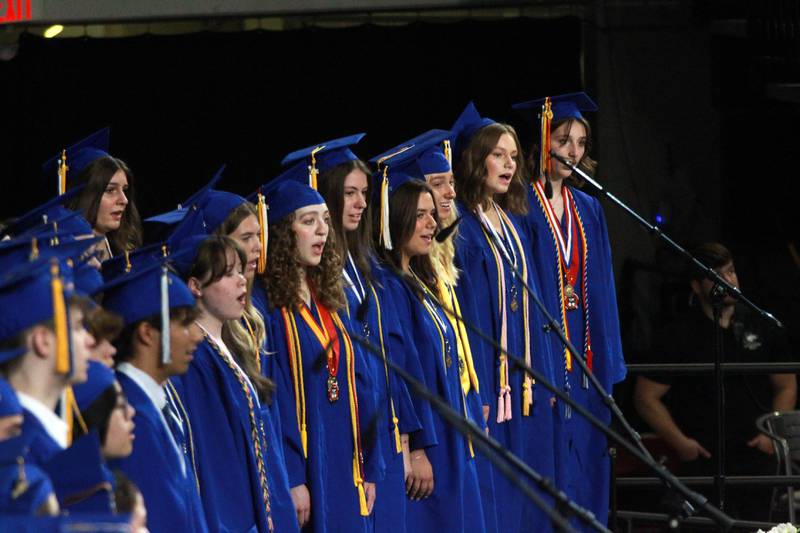 Geneva High School senior choir members perform during the school’s commencement ceremony on Tuesday, June 3, 2025 at Northern Illinois University in DeKalb.