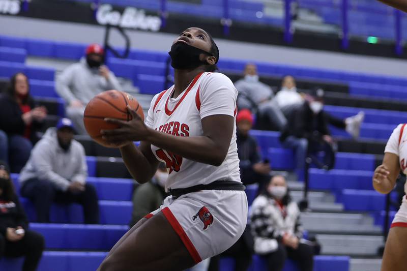 Bolingbrook’s Jasmine Jones looks to take a shot against Eisenhower in the Class 4A Lincoln-Way East Regional semifinal. Monday, Feb. 14, 2022, in Frankfort.
