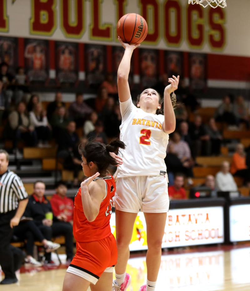 Batavia’s Brooke Carlson gets a shot up during a game against St. Charles East at Batavia on Thursday, Feb. 1, 2024.