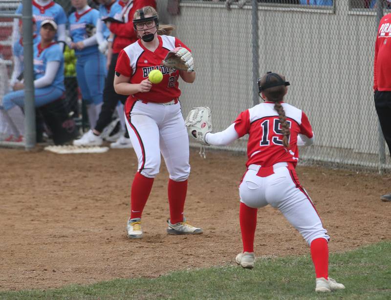 Streator's Joyce Walking and Caitlin Talty misjudges a pop fly in foul territory on Thursday, March 27, 2025 at Ottawa High School.