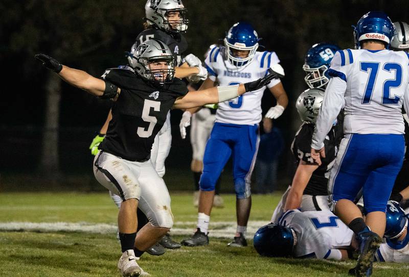 Kaneland's Dawson Trebolo (5) celebrates after a defensive stop against Riverside Brookfield during a 6A playoff football game at Kaneland High School in Maple Park on Friday, Oct 28, 2022.\