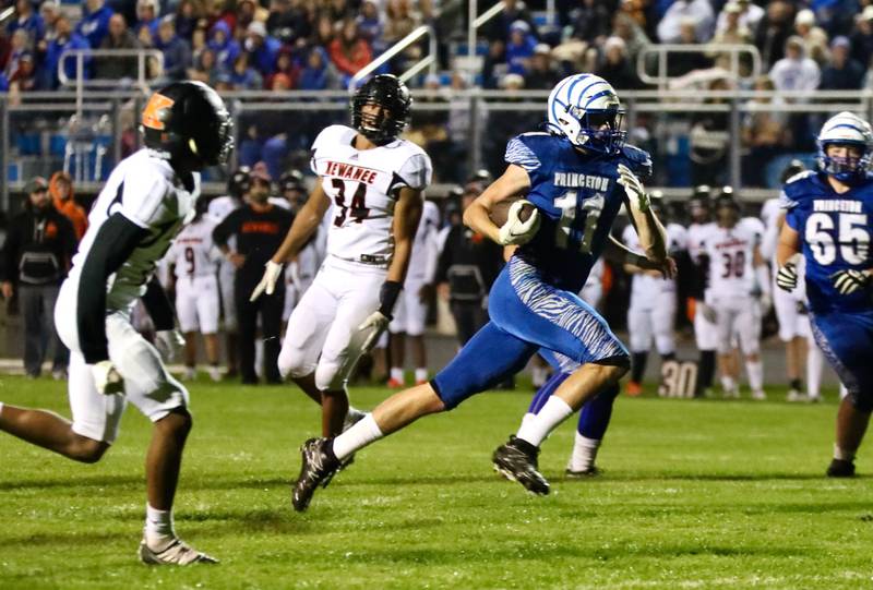 Princeton's Noah LaPorte returns an interception for a 43-yard touchdown Kewanee Friday night.