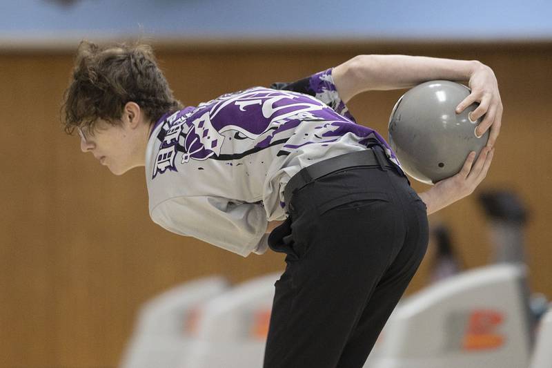 Dixon’s Clark Bonnewell loads up on the backswing for a frame against Sterling, Monday, Jan. 2, 2023.