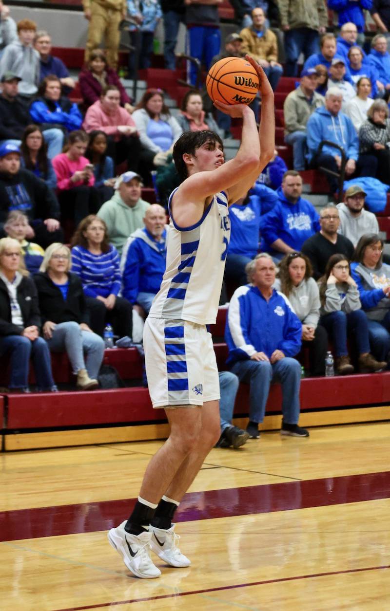 Princeton's Noah LaPorte spots up and makes a 3-pointer in the second half in Wednesday's sectional semifinals at Marengo. Princeton won 46-42 to advance to Friday's championship against Rock Falls.