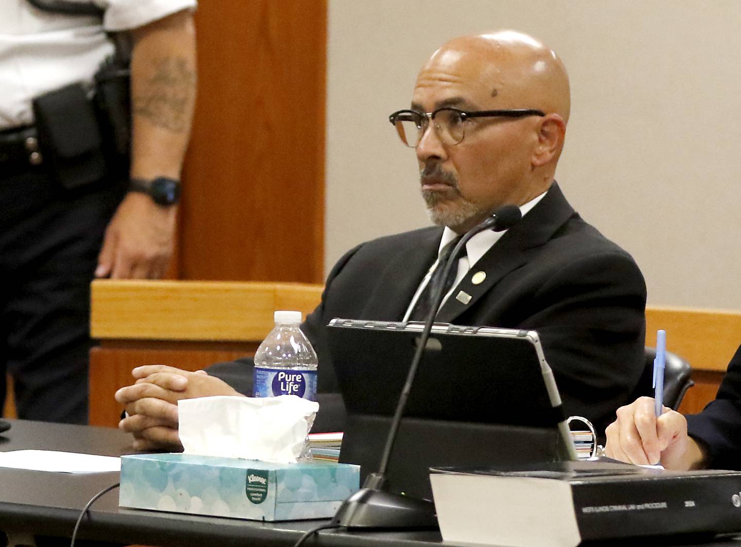 Carlos Acosta listens on Thursday, June 6, 2024, to Lake County Judge George Strickland as he sentences Acosta, a former Illinois Department of Children and Family Services employee, who was found criminally guilty for mishandling the case of AJ Freund before the Crystal Lake boy was killed by his mother, to six months in jail and 30 months of probation.