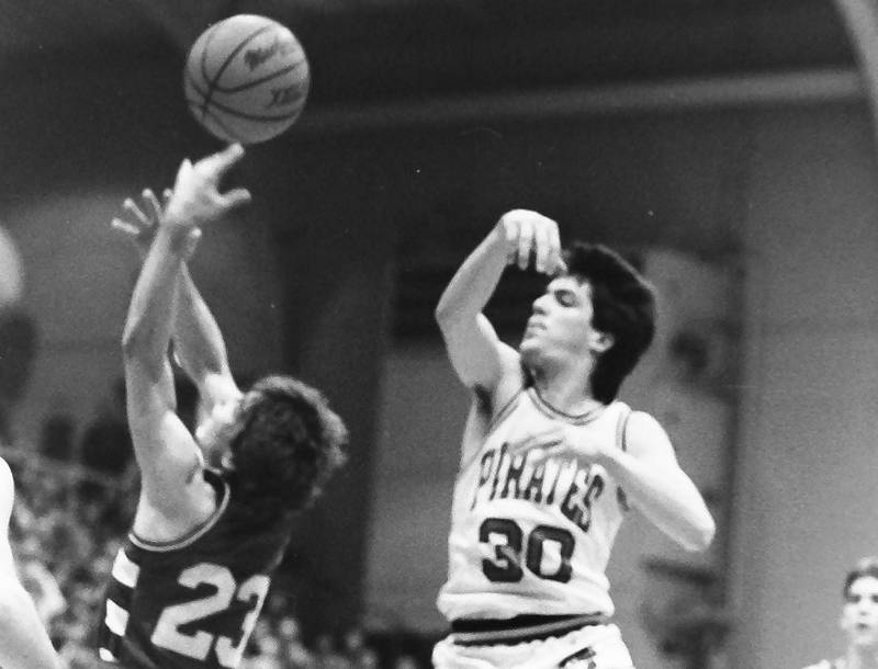 L-P's Mike Emerick misses a pass as Ottawa's Dewey Gould during the Regional title game on Saturday, Feb. 28, 1986 at La Salle-Peru Township High School.
