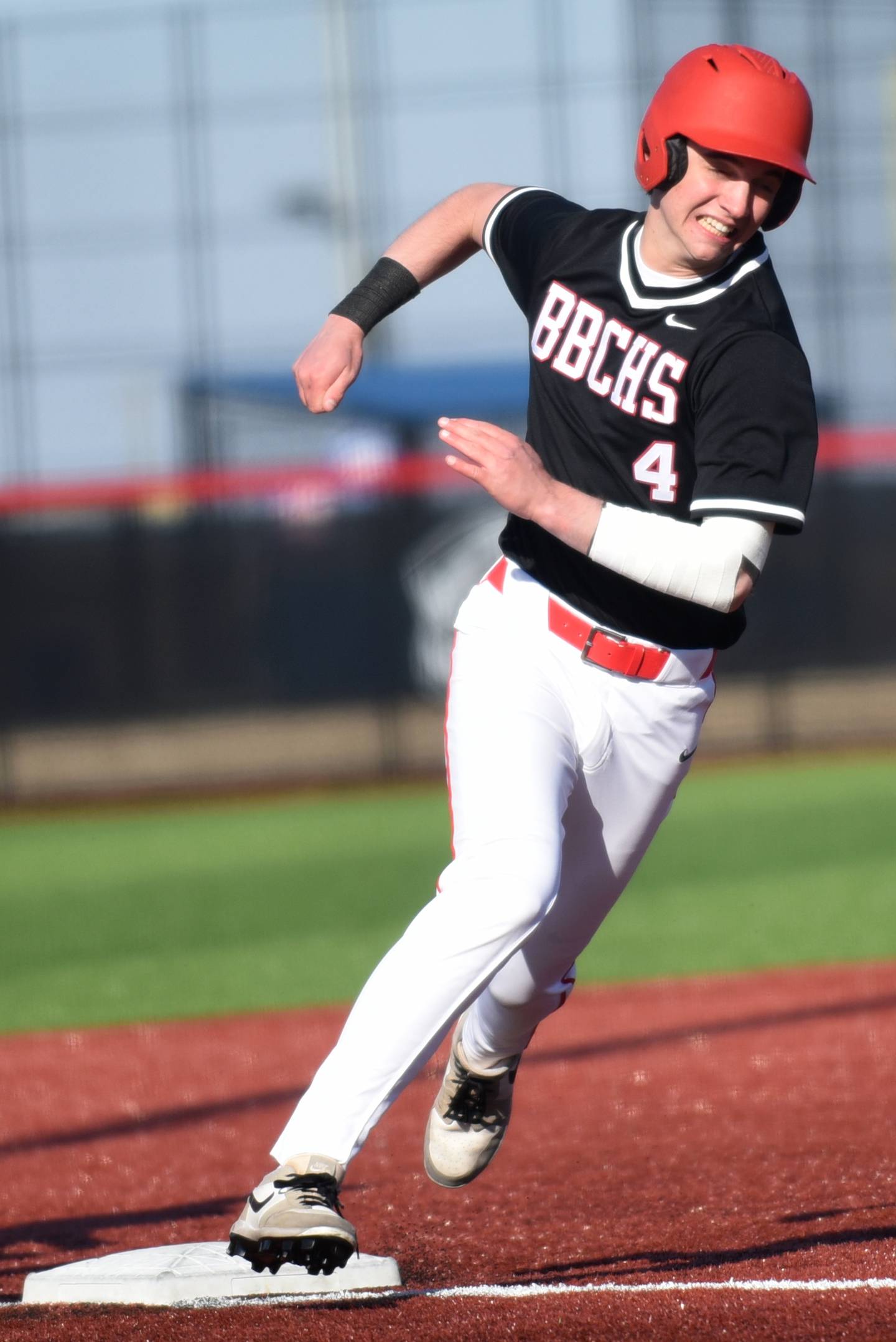 Bradley-Bourbonnais' Eric Rainbolt rounds third to score the tying run in a game against Bishop McNamara Saturday, March 28, 2026 at 315 Sports Park in Bradley.