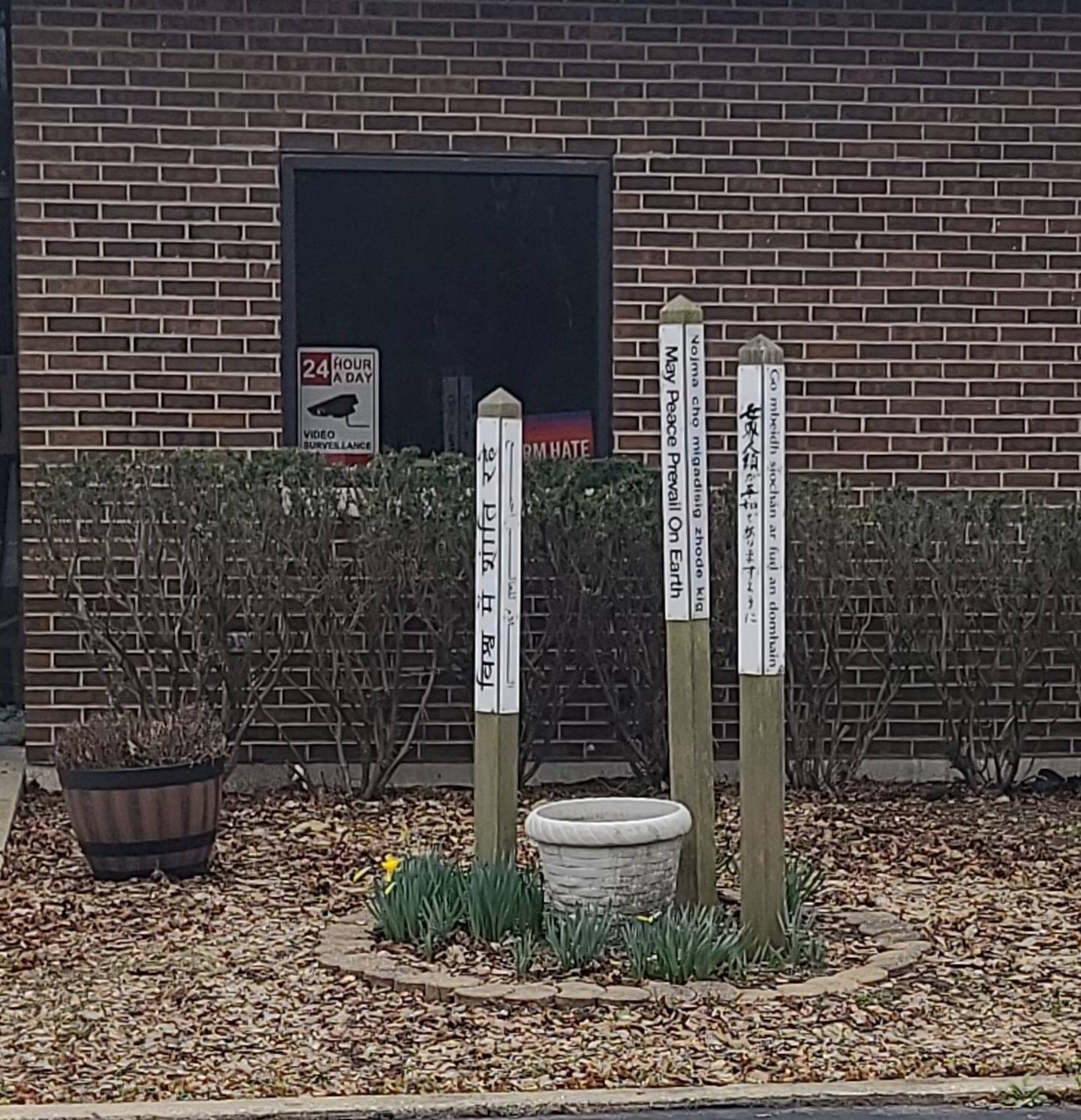 The Universalist Unitarian Church of Joliet recently renovated its peace pole garden because the original peace pole garden (seen above) was installed after the 9/11 terrorist attacks and dedicated on April 21, 2002. A rededication ceremony for the renovated peace pole garden will be held Sunday.