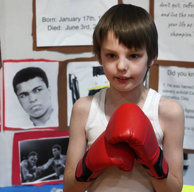 Third grader Kaleb Jaeger, playing Muhammed Ali, gives his presentation during the Hinckley Big Rock Elementary School Wax Museum Thursday, March 13, 2025, at the school in Hinckley.
