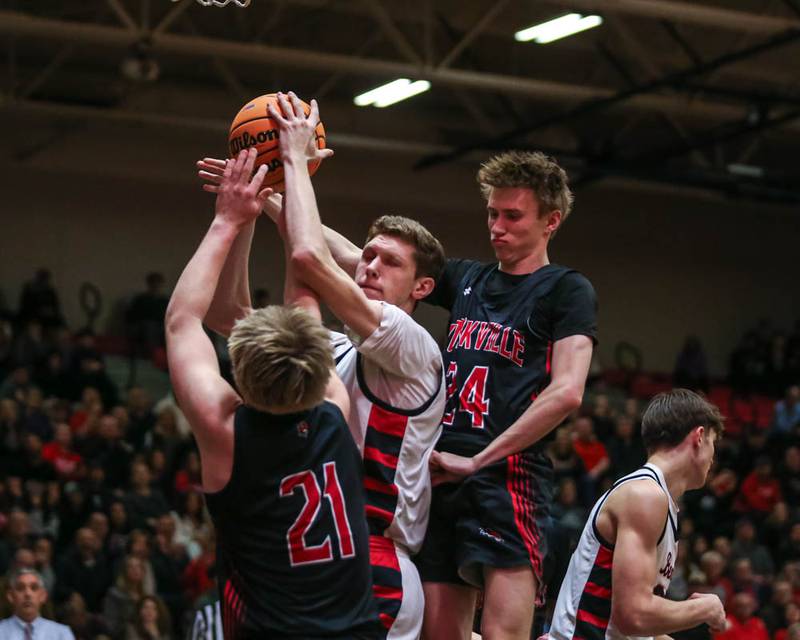 Benet's Colin Stack (42) is double teamed under the basket during their Class 4A Bolingbrook Sectional semifinal basketball game between Yorkville at Benet, March 3, 2026 in Bolingbrook.
