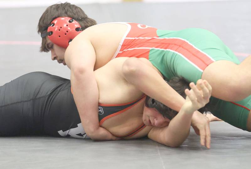 L-P's Logan Miller wrestles Kaneland's George Slepicka during a meet on Thursday, Jan. 22, 2026 in Sellett Gymnasium at L-P High School.