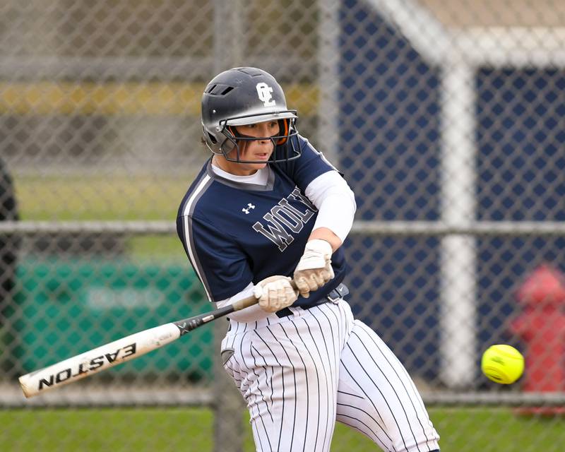 Oswego East’s Ryenne Sinta (21) makes contact with the ball  for a double during the game on Thursday April 17, 2025, while taking on Plainfield North held at Oswego East High School.