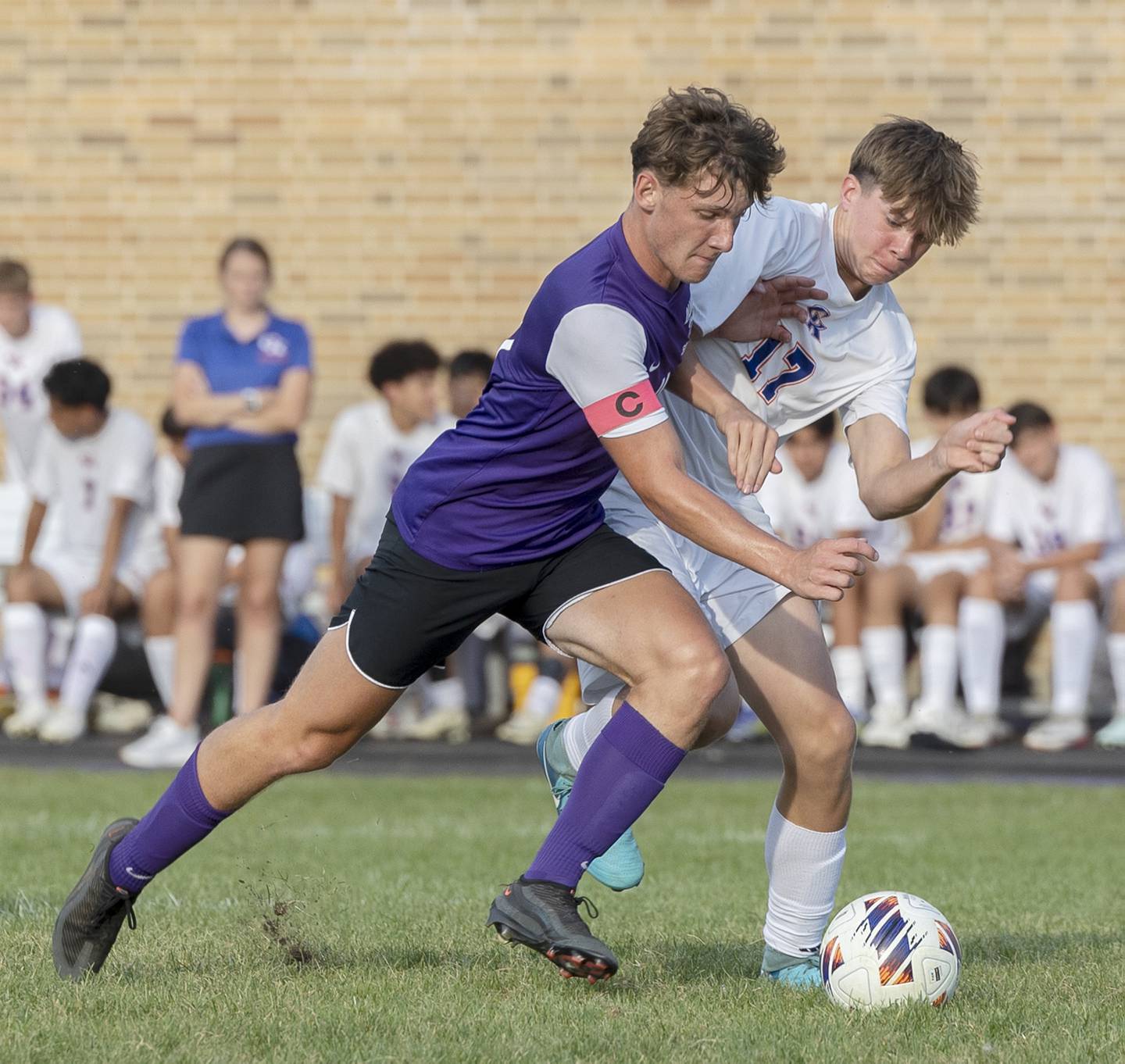 Dixon’s Jack Redell works against Genoa-Kingston’s Luke Lippold Tuesday, Sept. 2, 2025.