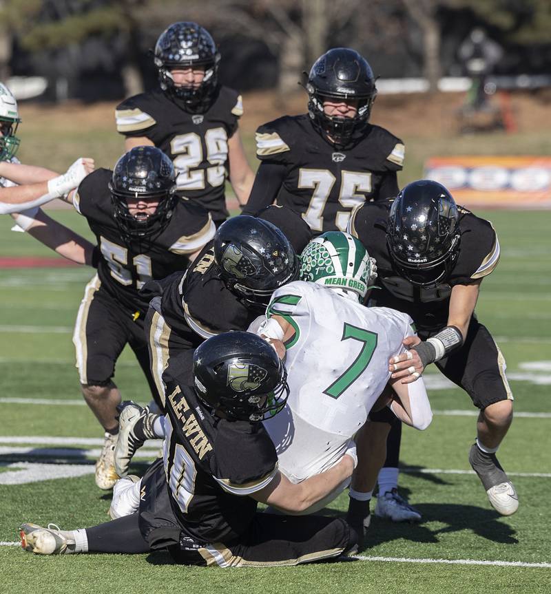 A claw of Panthers take down Brown County's Jack Sefton Friday, Nov. 28, 2025, in the Class 1A football finals at Hancock Stadium at ISU.