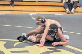 Football familiarity translates to wrestling win for Sycamore’s Adam Carrick; Spartans beat Rochelle