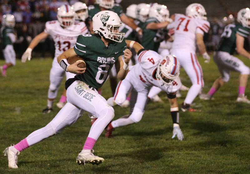 St. Bede quarterback Gino Ferrari runs the ball against Ottawa on Friday, Oct. 25, 2024 at St. Bede Academy.