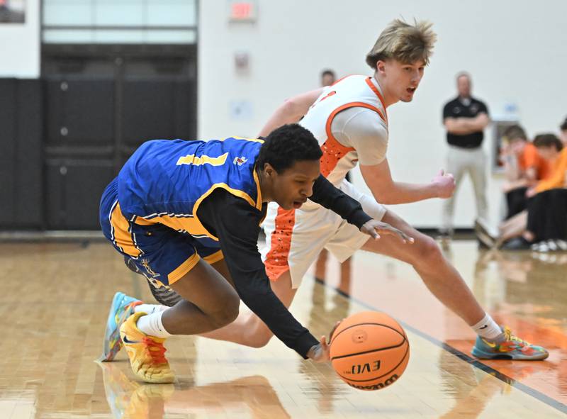 Joliet Central's Bernal Fox (1) tries to handle a loose ball during the 4A Lockport Regional game against Lincoln-Way West on Monday, FEB. 23, 2026, at New Lenox.