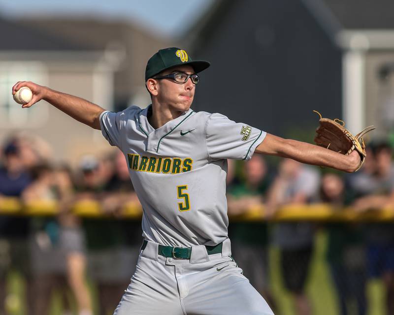 Waubonsie Valley's Ryan Morton (5) delivers a pitch during Class 4A Sectional Final Championship game between Downers Grove North at Waubonsie Valley.  May 31, 2024