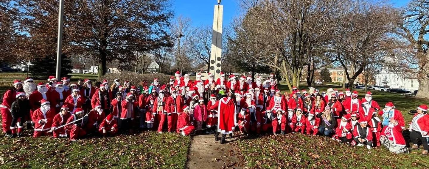 Santas paraded down Route 47 in Yorkville on Dec. 9 raising money for Suicide Prevention Services of  America.