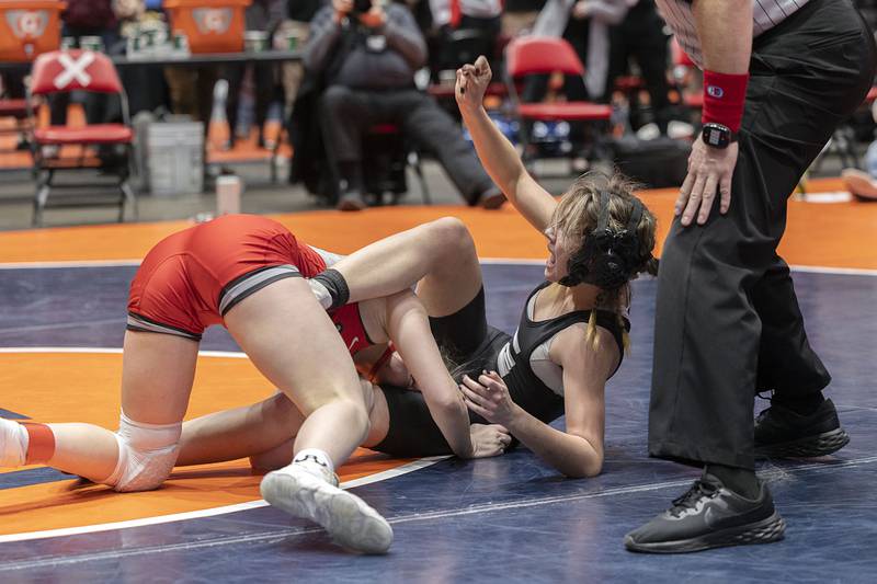 Ayane Jasinski of Fox Lake Grant celebrates after winning in overtime the 110 pound championship match at the IHSA girls state wrestling championships Saturday, Feb. 25, 2023. Jasinski defeated Gracie Guarino of Lincolnway Central.