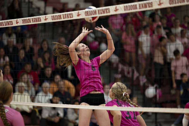 Oregon’s Olivia Wynn sets the ball Tuesday, Oct. 11, 2022 against Rock Falls.