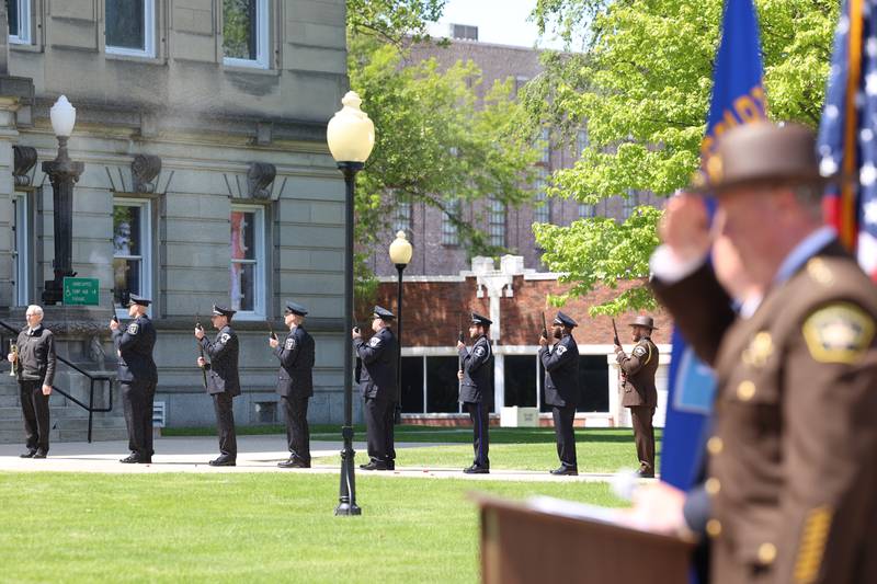 Members of the Kankakee County Area Honor Guard perform the 21 gun salute during the Kankakee County Law Enforcement Memorial on Thursday, May 14, 2026, at the Kankakee County Courthouse.