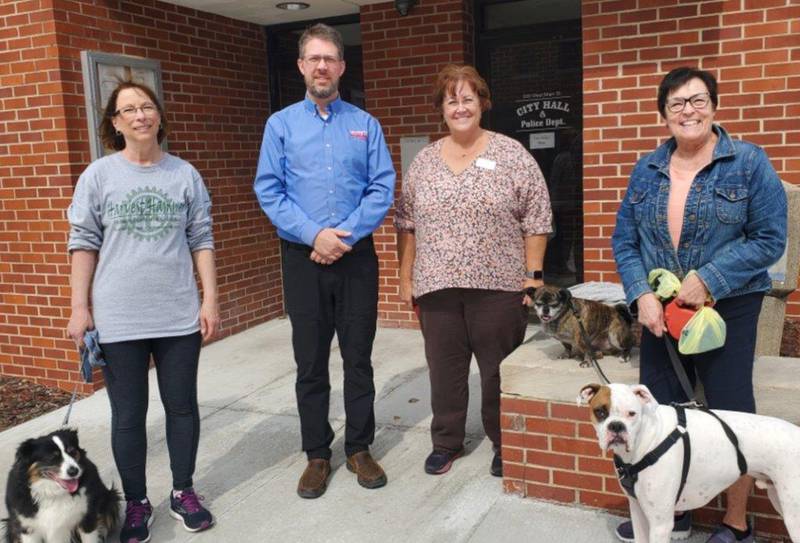Pictured (left to right): Kathy Schmidt (OTM), City Administrator Barry Dykhuizen, Karla Burn (OTM), Snickers, Charla Olson and Bruno the dog.The City of Morrison has donated $12,500 to the Morrison Bark Park to help raise the fence this Spring/Summer 2022. Updates and information as to when the fencing will start being installed will come out soon on the On the Move with Parks and Recreation's  (OTM) Facebook page. Donations are still needed and can be made at Morrison TBK Bank, 200 West Main St., Morrison. Please make the checks payable to Morrison Lions Foundation, NFP with notation on check and envelope that says "Morrison Dog Park."